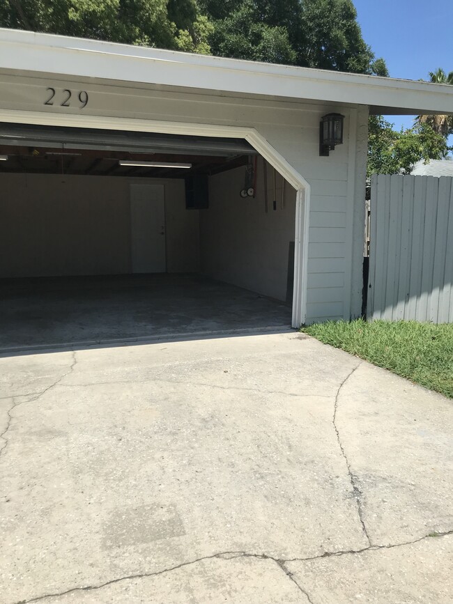 Right side of garage belongs to apartment rental - 229 Summerwood Trail