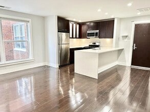 Building Photo - Sleek One-Bedroom in Eastern Market - Parking Spot Included!