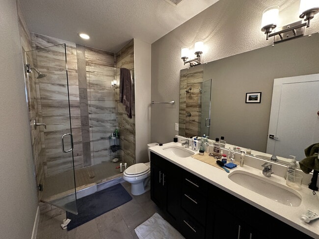 Building Photo - "Experience Modern Comfort: Spacious 2-Bed...