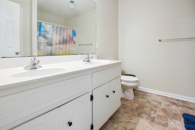 Building Photo - Pet Friendly Three Bedroom with Bonus!