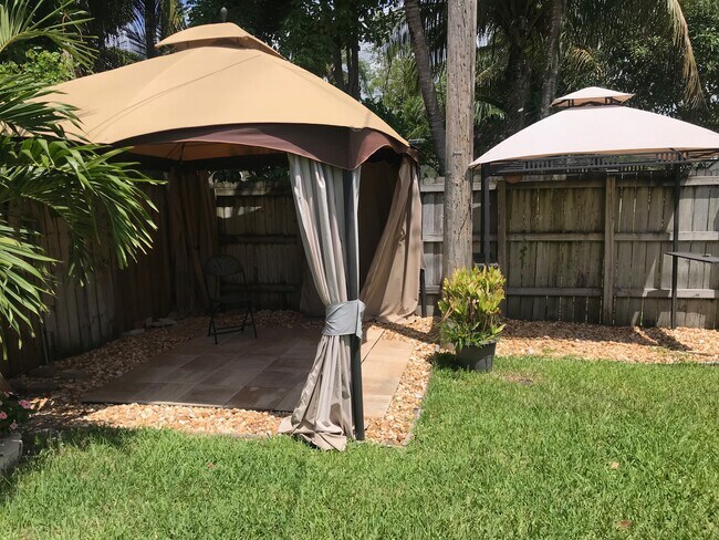 two gazebos for grilling area - 1473 NE 48th St