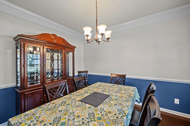Building Photo - Relax by the Water – 4BR Home with Pond Views in Creekside