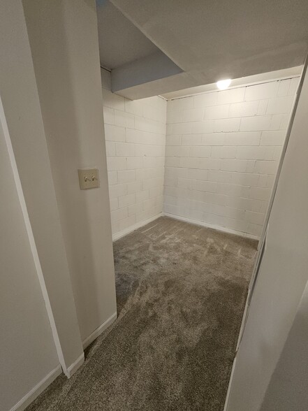 Lower level landing area has room for a desk or whatever you'd like to add. - 2353 Mailand Ct E