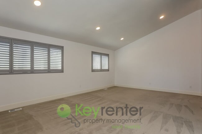 Building Photo - Spacious Living with Balconies, Deck, and Private Yard