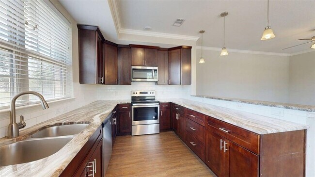Building Photo - 2027 Harvey Mitchell Pkwy S