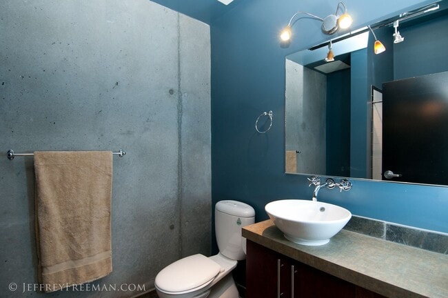 Building Photo - Stunning Penthouse Loft in the Mosaic Condos - Gas Fireplaces, A/C, W/D in unit!