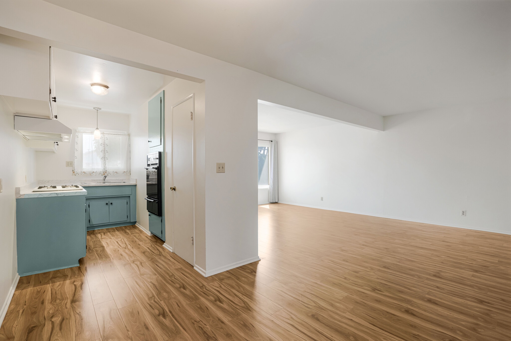 Kitchen and Living Room view from dining Area - 200 Chester Way