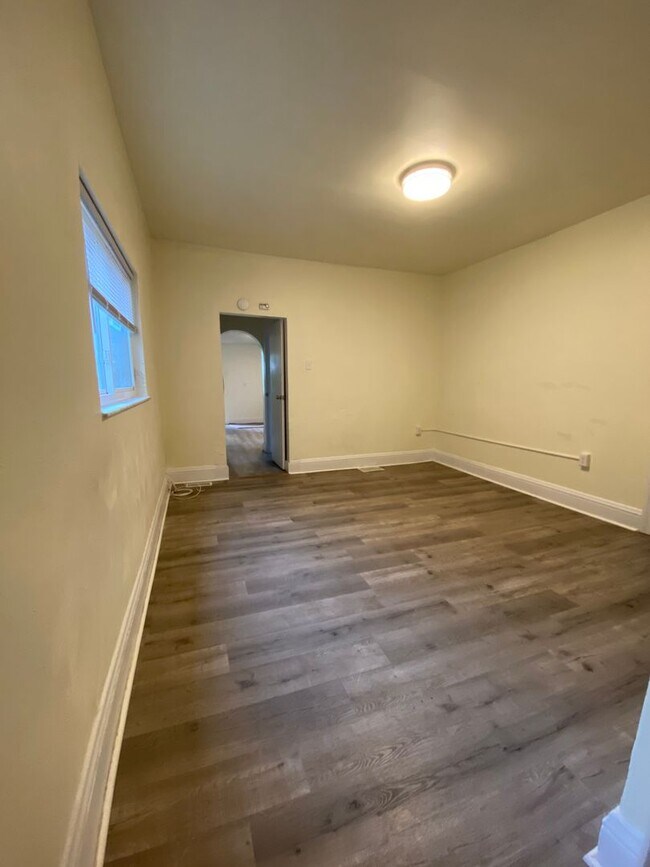 Building Photo - Updated 2BR Apartment with office now show...