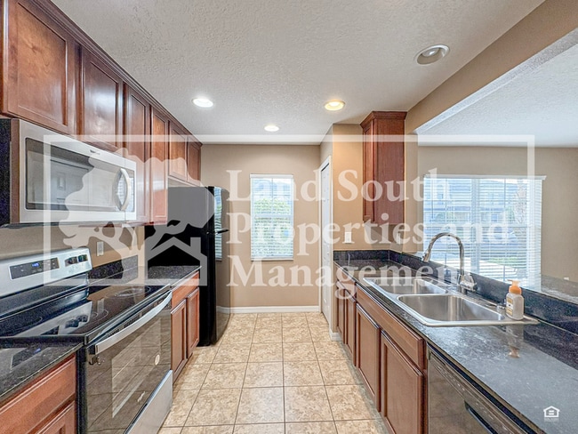 Building Photo - 5432 River Rock Rd