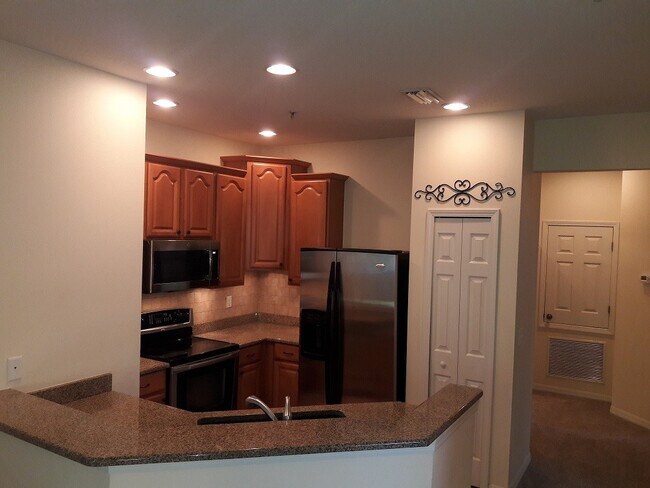 Building Photo - Annual unfurnished-3 bedroom, 2 bath condo with garage in gated community!