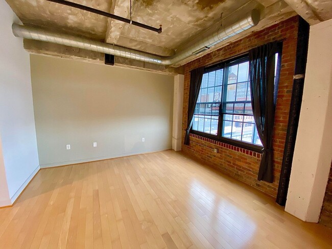 Building Photo - Stunning Industrial-Contemporary One Bedro...