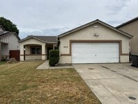 Building Photo - Three Bed, Two Bath Home with Two Car Garage
