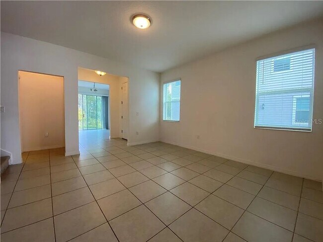 Building Photo - Beautiful End Unit Townhome Near Lake Nona w/ 2-Car Garage & Conservation Views!