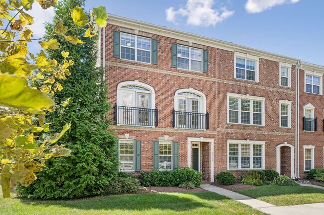 Primary Photo - This beautifully maintained end-unit brick...