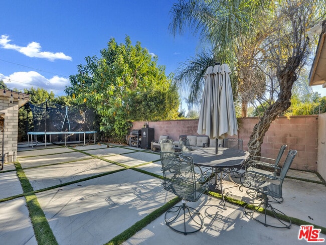 Building Photo - 6842 Ranchito Ave