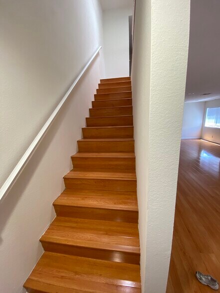 Staircase to second floor - 308 E Valencia Ave