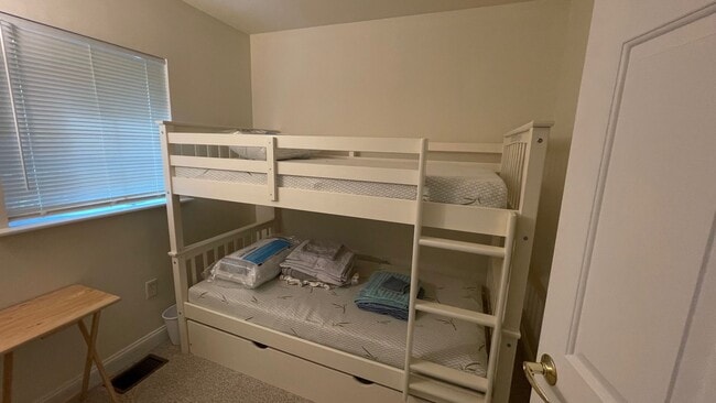 Building Photo - Spacious Furnished 3-Bedroom Condo – All U...