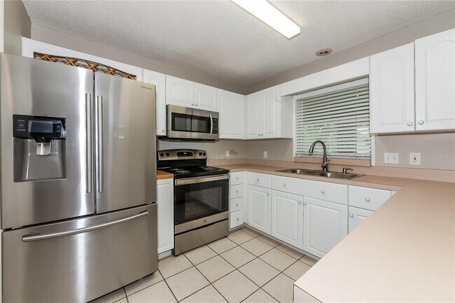 Building Photo - 7527 42nd Ct E