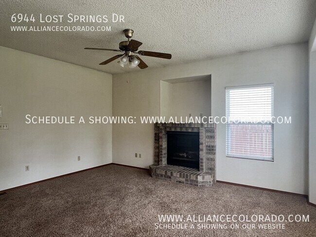 Building Photo - 6944 Lost Springs Dr