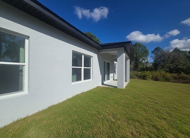 Building Photo - Brand New 4/2/2- South Lehigh Acres