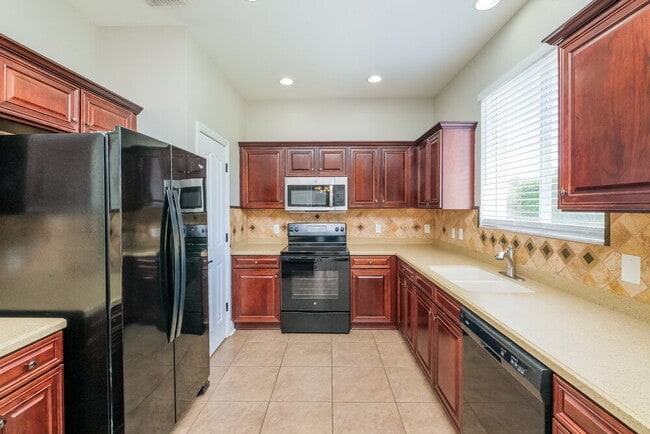Building Photo - 9548 Simeon Dr