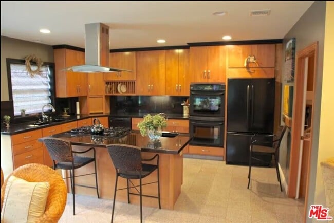 Building Photo - 4930 Garden Grove Ave