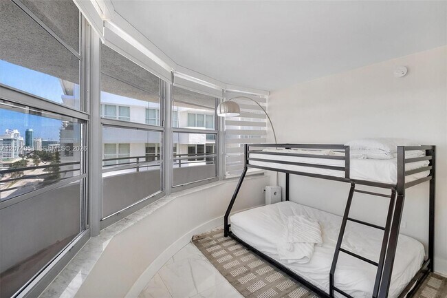 Building Photo - 5555 Collins Ave