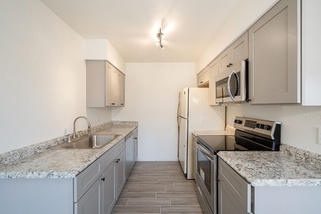 Building Photo - Updated home with large backyard & 2 car g...