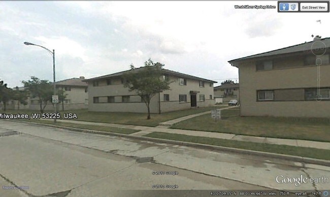 Primary Photo - 9235-9415 W Silver Spring Dr