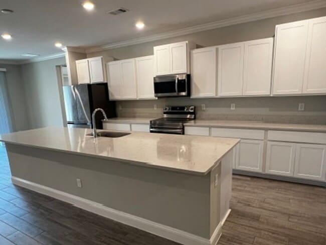 Building Photo - FOUR BEDROOMS and THREE BATHS For Rent