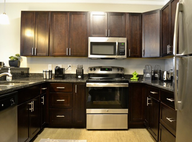 Spacious Kitchen | Pantry | - Stonegate at the Crossroads Apartments