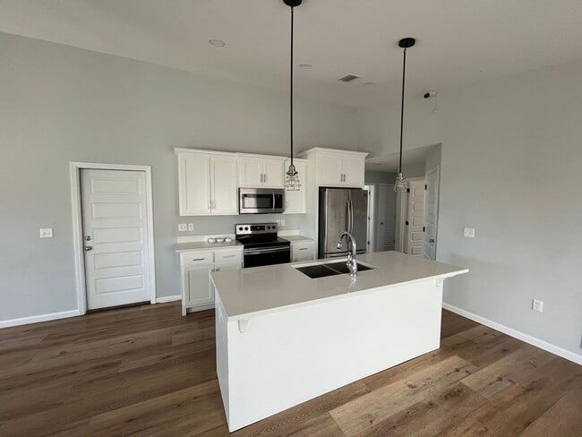 Building Photo - BRAND NEW! Very nice 3/2 with open floor plan! Close to TAFB