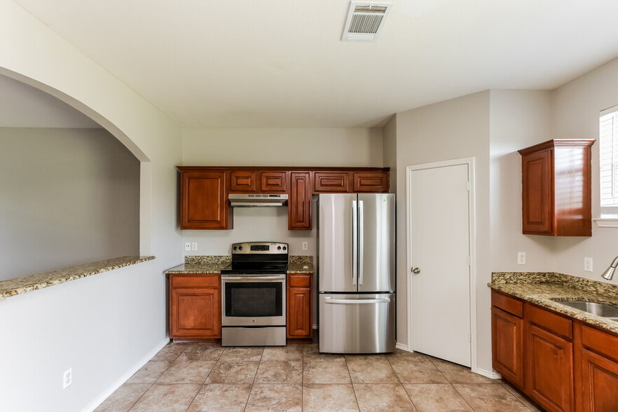 Building Photo - 9715 Checota Dr