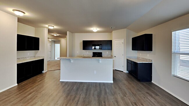 Building Photo - Very Nice and Spacious 4 Bedroom 2 Bath Home With Office/Flex Space in Yukon Schools