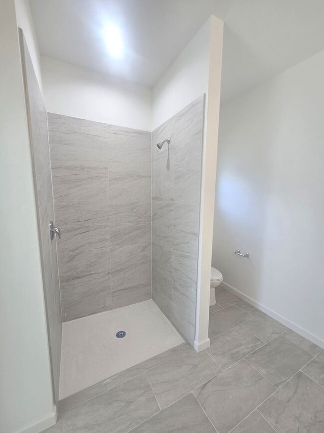 Building Photo - Brand New 4/2/2- South Lehigh Acres