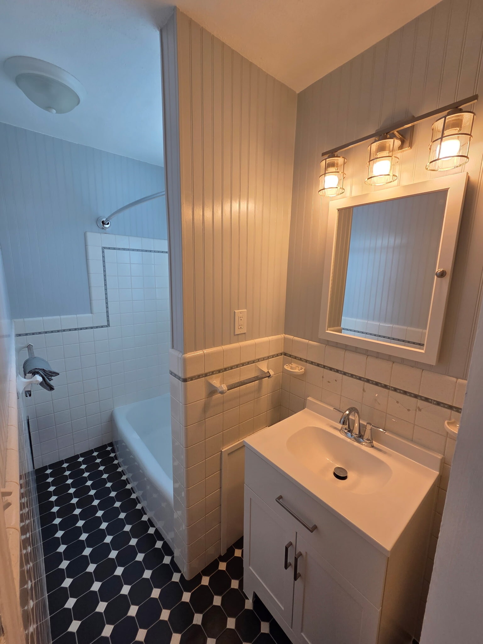 Bathroom with tub and shower - 146 E 2nd St