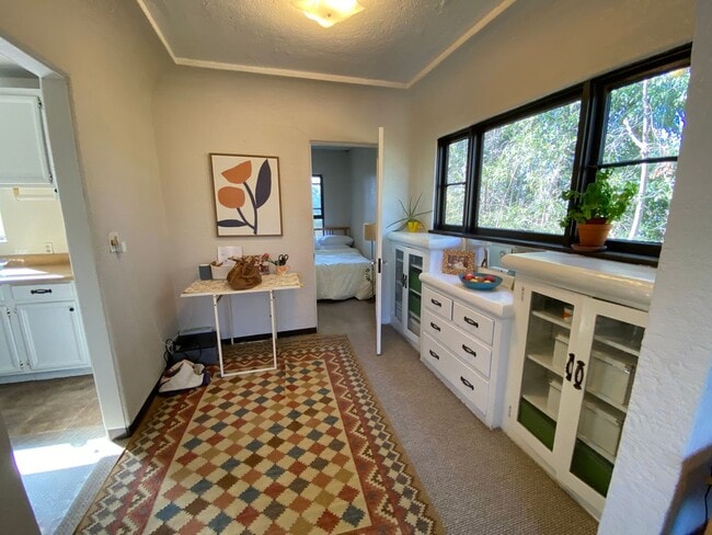 Building Photo - Craftsman Style One Bedroom with Decorative Fireplace! On Site Washer and Dryer & Assigned Storag...