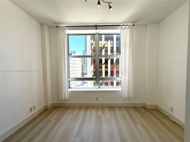 Building Photo - 111 E Flagler St