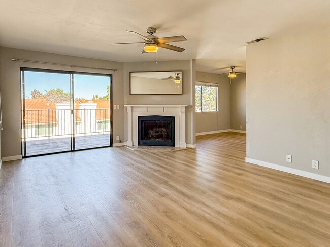 Living Room with gas fireplace.  Leads out to large balcony and views - 3086 Corte Trabuco