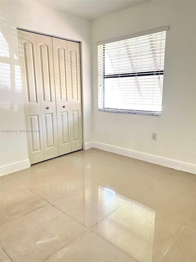 Building Photo - 6866 NW 173rd Dr