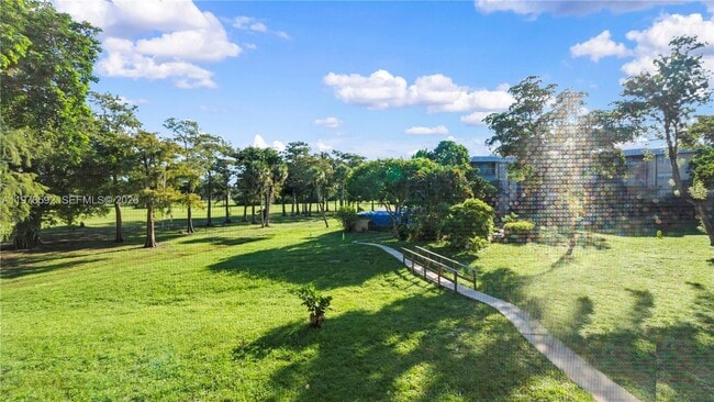 Building Photo - 6301 N Falls Cir Dr