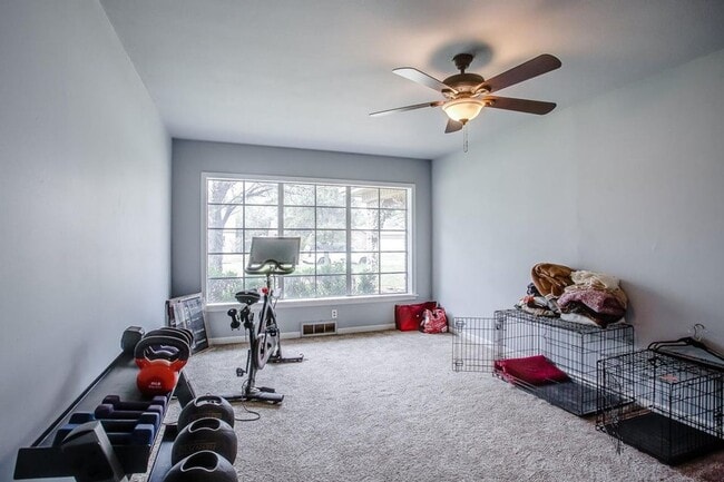 Building Photo - Spacious 4-Bedroom Home with Dual Living Areas