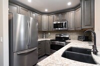 Building Photo - Top Floor Furnished 2 Bedroom Home Near SD...