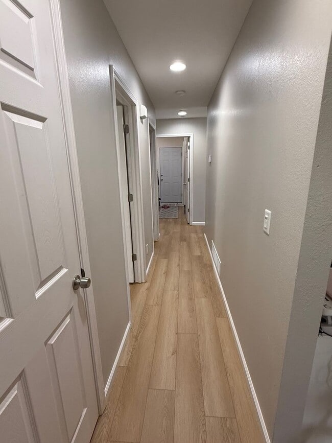 Building Photo - Updated 3BR Home with Luxury Vinyl Plank Flooring Throughout & Spacious Yard