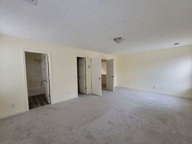 Building Photo - Lake Front Property. Loft - Swim/Tennis - Stainless Steel Appliances