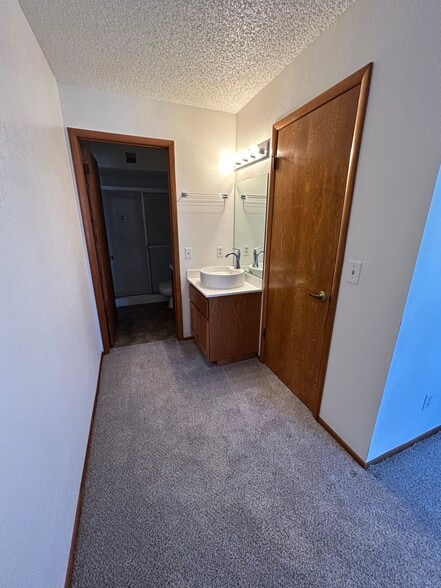 Vanity with sink in master bedroom - 1957 Mesquite Ave