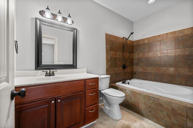 Building Photo - Main-Level Living End-Unit Townhome