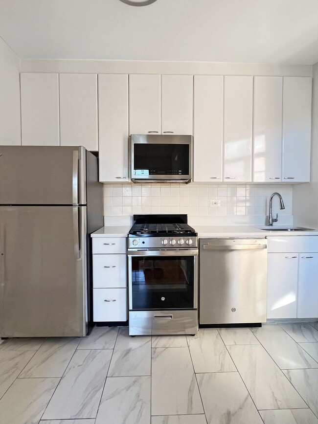 Building Photo - The Leslie — A Private Garden Enclave for the Modern New Yorker