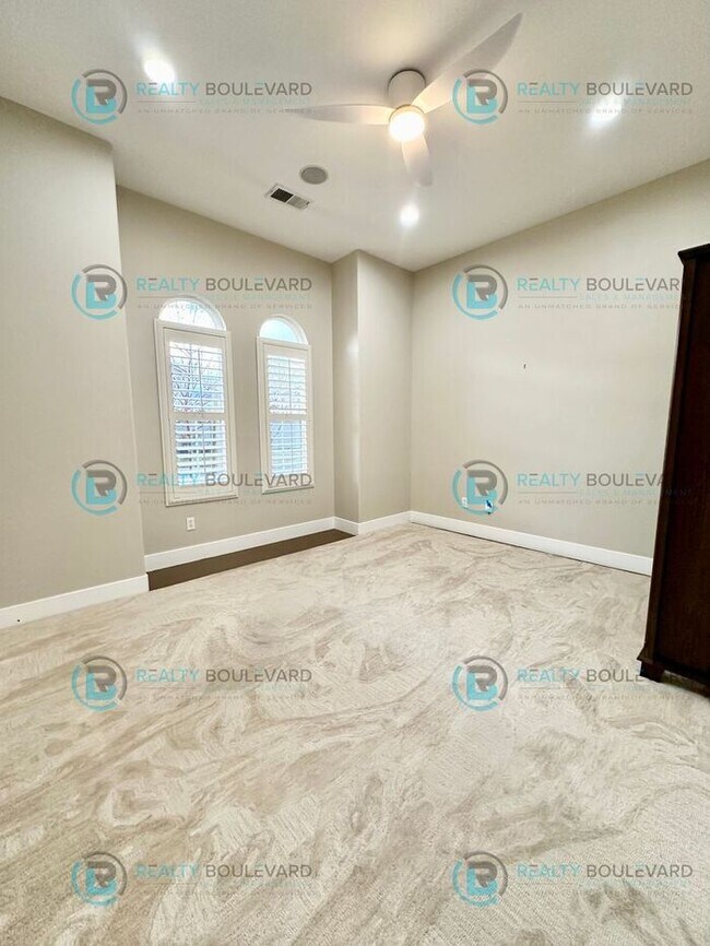 Building Photo - Open Kitchen, Expansive Living, and Covered Patio in Tranquil South Reno Near Trails, Parks & Sho...