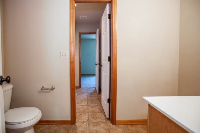 Building Photo - 3D Tour Available - Quick Access to Fort Riley + Community Pool + Washer & Dryer + Lawn Care incl...